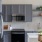 Modern model apartment kitchen with stainless steel appliances at Aventon Gem Lake