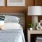 Furnished apartment bedroom with a bed and side table at Aventon Gem Lake