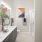 Primary bathroom with double vanity in model apartment home at Aventon Gem Lake