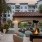  Three Bedroom Luxury Apartments in Maitland FL - Perla Gem Lake - Outdoor Lounge Area with Firepit, Chairs, and Covered TV hub, by the Pool